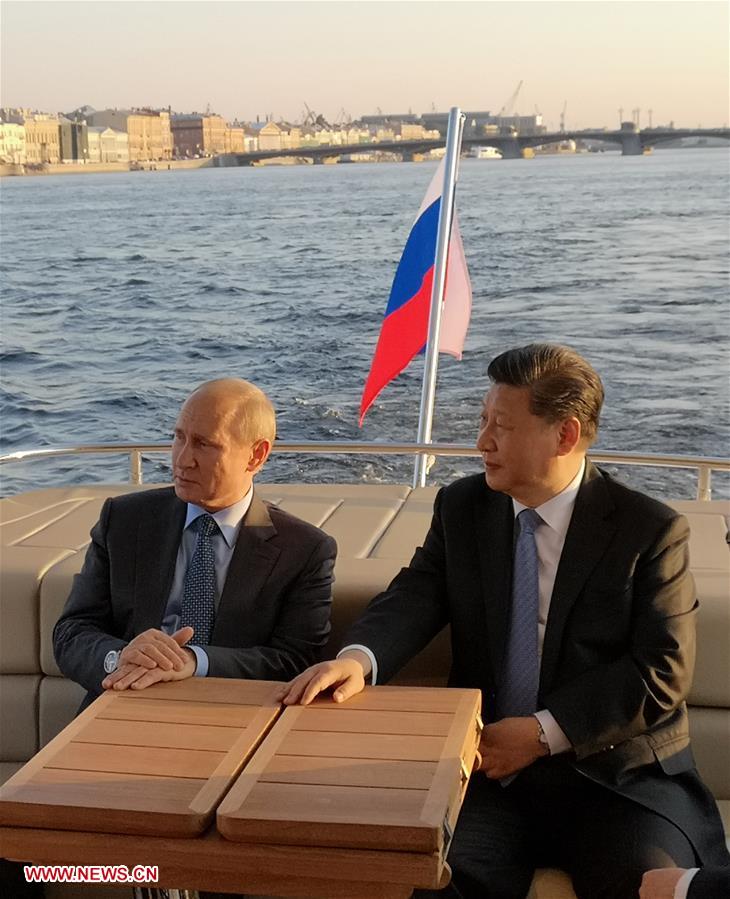 RUSSIA-ST. PETERSBURG-XI JINPING-PUTIN-MEETING 