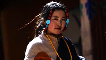 Believers pray for blessings at Drepung Monastery in Lhasa