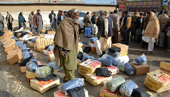 Relief goods distributed to people affected by rain in SW Pakistan