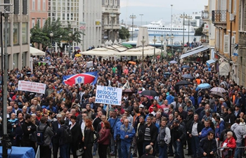 Croatian shipyard workers participate in strike march through central Rijeka, Croatia